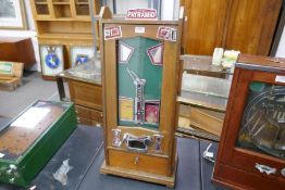 A vintage Bryans Pyramid coin operated amusement machine