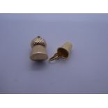 9ct yellow gold bell charm, marked 375, 1.3g approx and 18ct yellow gold thimble charm, marked 750,