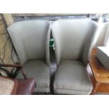 Two high back green chairs