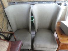 Two high back green chairs