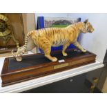 A Franklin Mint Tiger model (On The Prowl) with stand, tiger length 54cm