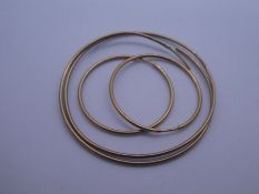 Two pairs of 9ct yellow gold hoops, the largest 4.5cm, both marked, approx 3g