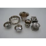 A quantity of 800 silver items, to include petal design dishes of pretty design, a matchbox case, et