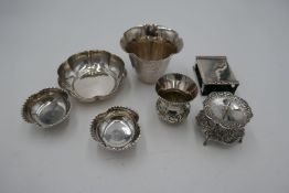 A quantity of 800 silver items, to include petal design dishes of pretty design, a matchbox case, et