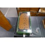 A vintage Bagatelle pin table operating on Old Pennies - working condition