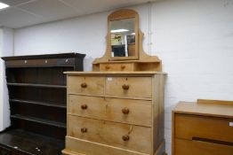 An old stripped pine dressing chest on plinth base, 96cm