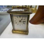 A small Mappin and Webb brass carriage clock