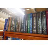 A selection of mostly hardback books including Folios and Readers Digests