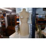 A dressmaker's dummy and bust