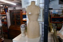 A dressmaker's dummy and bust