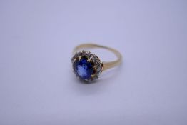 Antique sapphire and diamond cluster ring on plain polished shank, central oval faceted sapphire, ap