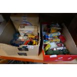 A box of Matchbox vehicles and a box of Corgi vehicles, etc