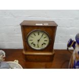 A late 19th Century walnut mantle clock having line inlay