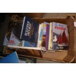 Four boxes of books on various subjects including boating, etc