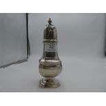 A large silver Adie Brothers Ltd sugar sifter having decorative pierced dome top, lid and a raised p