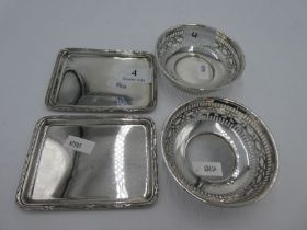 A pair of silver small dishes by Mappin and Webb, London 1919 with decorative border and marked Mapp