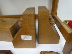 A pair of oak carved bookends, decorated mouse, probably Mouseman Thompson