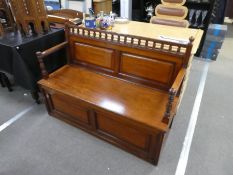 A late 19th Century mahogany hall bench having box base with front flap, 126cm