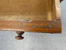An early 20th Century, teak Cabin Desk, having drawers and cupboard stamped "R.Y. PRINCE ALBERT"