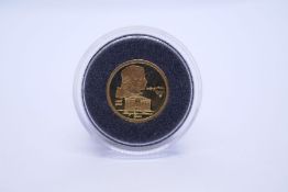 Cased Gold coin; a cased 1000 Tot pot 1/25 oz 999.9 gold proof coin