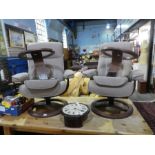A  pair of HSL stress less armchairs with matching stools