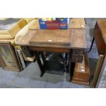 An old oak cased Singer sewing machine and one other