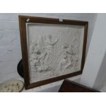 A plaster plaque depicting ancient Greek figures with snakes, 67.5 x 58cm, and one other smalle