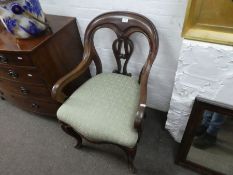 A Victorian mahogany open armchair with pierced splat on cabriole legs