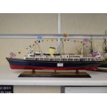 A wooden model of The Royal Yacht Britannia and one other of HMS Victory (Britannia 73cm)