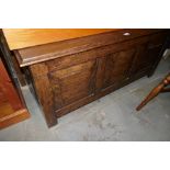 A reproduction Oak panel Coffer