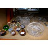 A selection of paperweights including Caithness and some glass bowls, etc