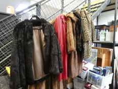 A quantity of fur coats and other coats, hats and similar