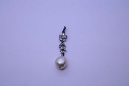 Antique diamond and pearl pendant AF, with flower cluster of diamonds above diamond inset leaves and