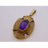 9ct yellow gold Oval amethyst pendant, 30mm x 20mm, Import mark London, maker GS, 5.7g approx