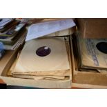 Three boxes containing vinyl 78s of various genres of music, and a box of various LPs etc