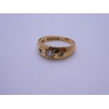 18ct yellow gold three stone gypsy ring, with 3 starburst set diamonds the largest approx 0.10 carat