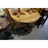 An (Old Charm) Oak extending dining table and set of 4 matching chairs