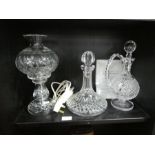 Waterford, a glass lamp, a ship's decanter and a Claret decanter, with certificate