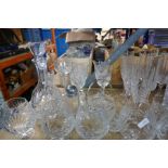 A large selection of cut glass including decanters, glasses, etc