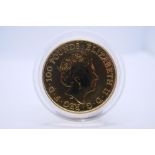 A 2017 Britannia 1 oz 100 pound gold coin, in capsule
