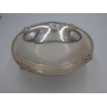 A silver fruit bowl on a raised pedestal foot having embossed border, hallmarked London 1930, Blackm