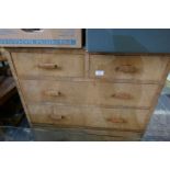 A 1930s Burr Walnut chest having 2 short and 3 long drawers