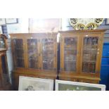 Two similar oak book cases having leaded glass doors above drawers and cupboards by Old Charm