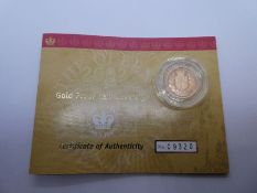 The Royal Mint; The 2002 United Kingdom Gold Proof Half Sovereign, with certificate of Authenticity,