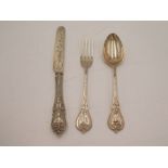 A very ornate Victorian silver knife, fork and spoon set by Thomas Prime and Son. Birmingham 1875 -