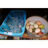 A quantity of marble eggs, glass scent bottles and sundry