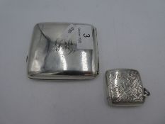 A silver Birmingham cigarette case by Hazelwood and Co., 1919, having initialled front and gilt inte