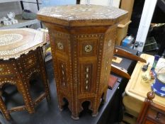 A Syrian Moorish octagonal side table having inlaid decoration, height 56cm