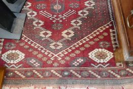 A red grand rug having Geometric decoration, 141cm 2 102cm