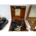 An early 20th Century Sextant marked S Stevenson, in original fitted case and additional book